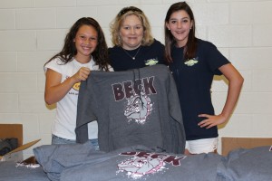Student Volunteer Rachel Regner, Beck Jr. High PTA Volunteer Beth Fortier, and Student Volunteer Claire Fortier