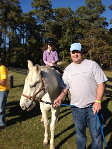 One of Hannah Holt’s favorite activities at the Katori Nation campouts is horseback riding. Pictured is Hannah with her dad Clint.