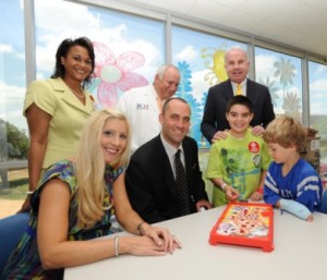 Photo 2 - Schaubs Riley-Brown Wallace and patients In playroom (2)