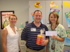 Spring Creek fundraiser check delivery